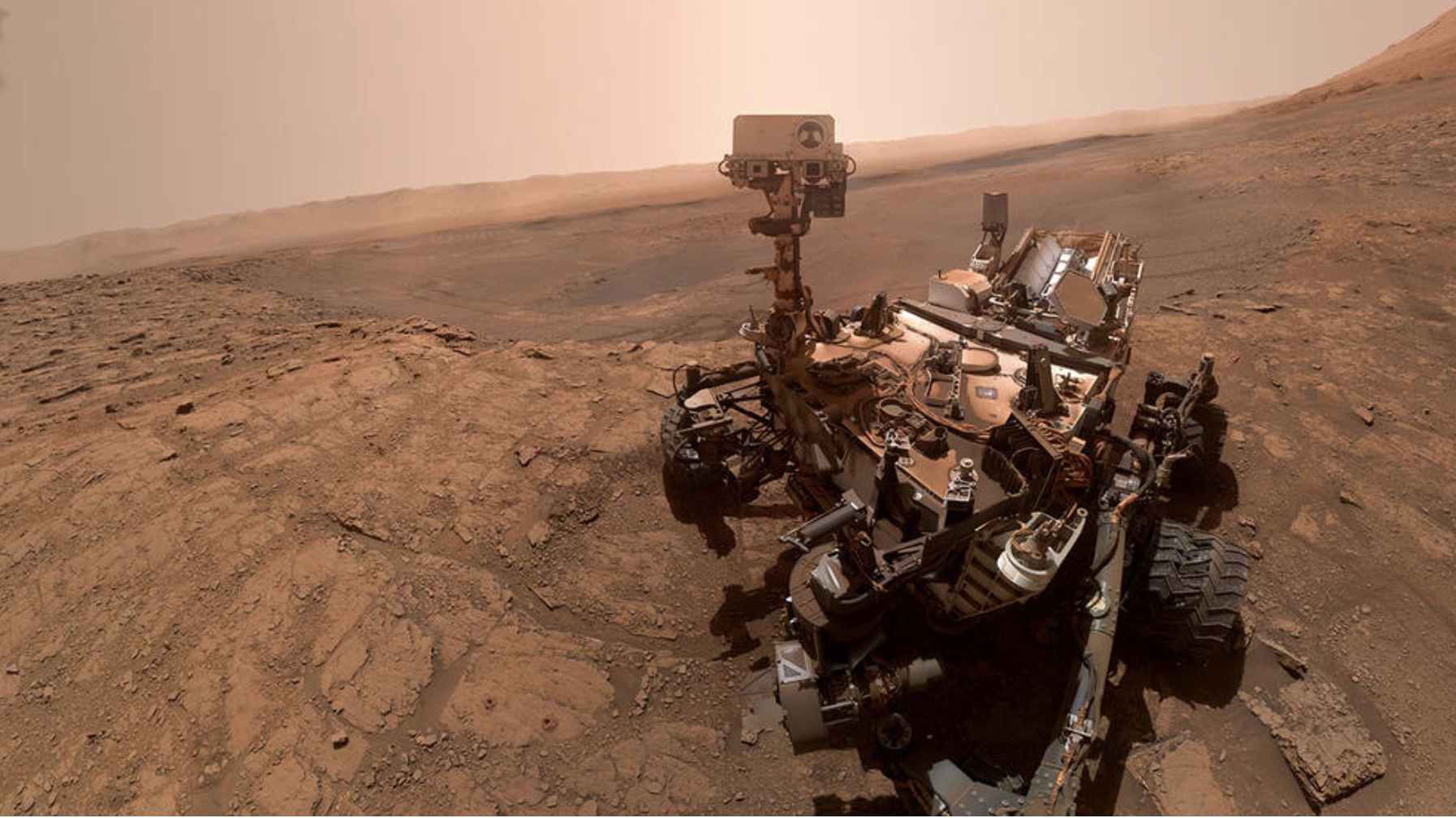 image of robot on lunar landscape