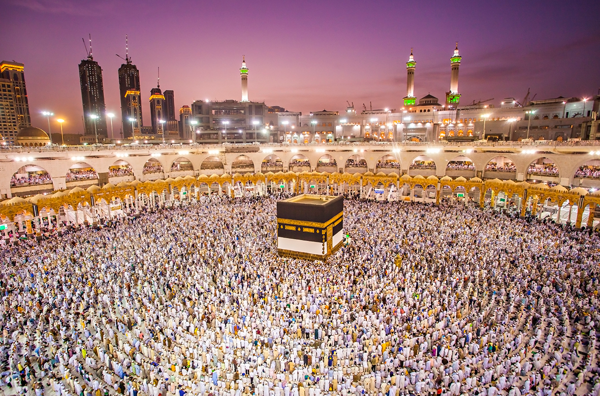 Aerial view of the Kaaba in Mecca surrounded by a crowd of pilgrims during the Hajj pilgrimage.