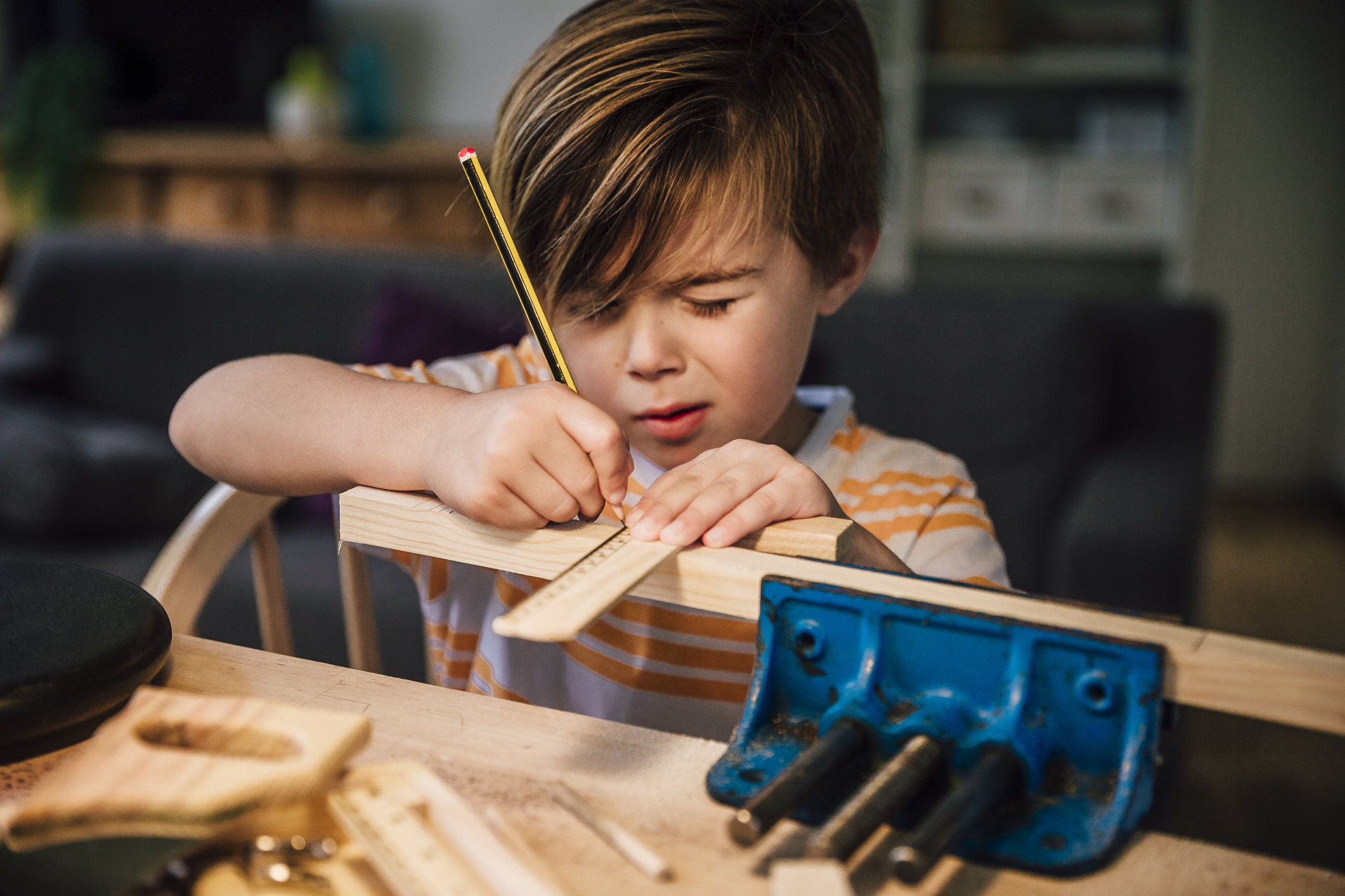 Child doing woodwork