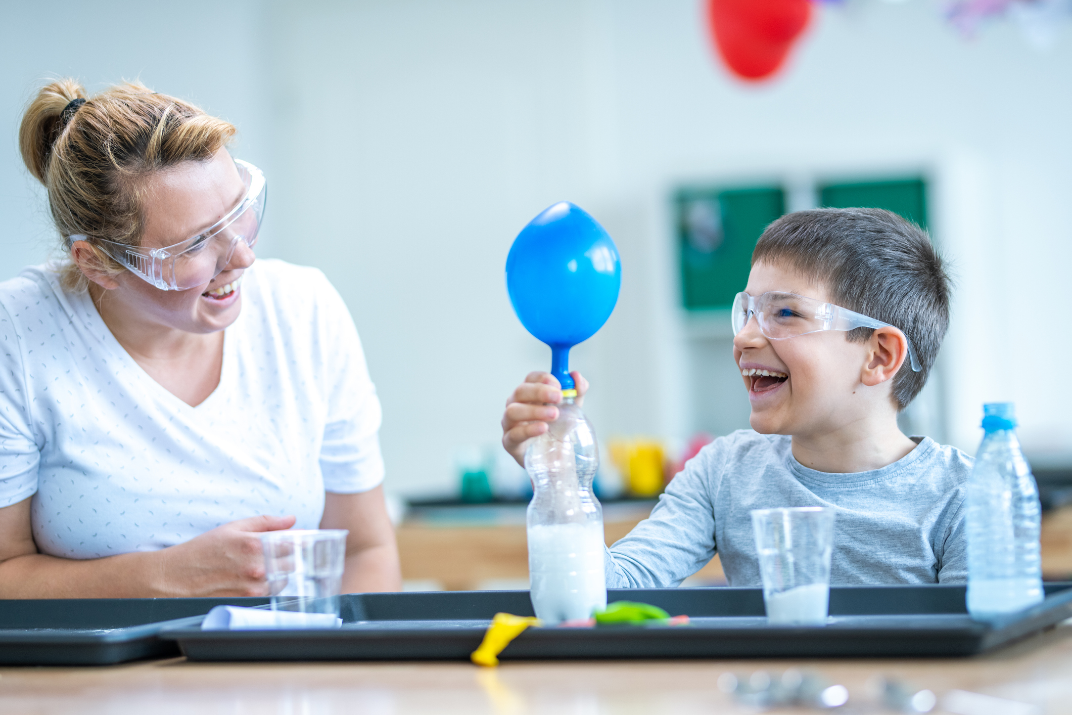 Boy doing science experiment in laboratory