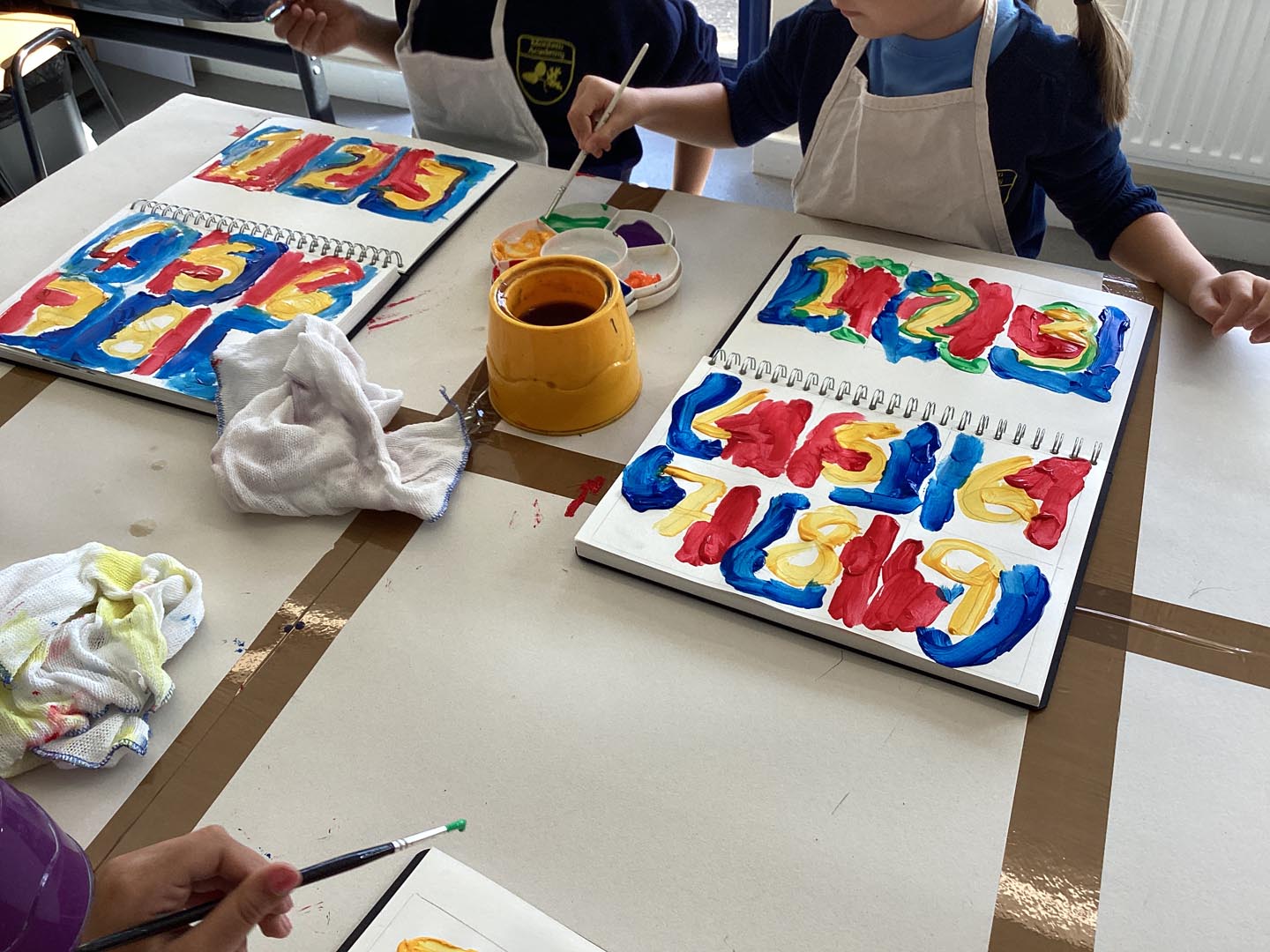 Children's painted work on a table